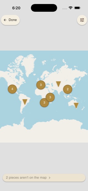 A world map with Hew's brass pins clustered by locality